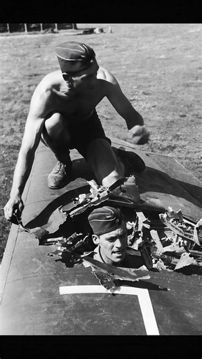 Luftwaffe technicians pose for a picture showing battle damage on the wing of the Junkers Ju.87 #ww2 #military #aviation | World War II Aircraft