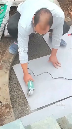 The process of cutting and installing floor tiles #shorts