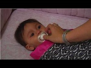 Baby Parenting Skills : How to Put a Baby to Sleep With a Pacifier