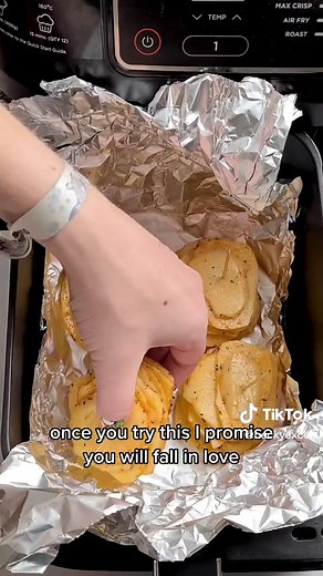 AIR FRYER CRISPY POTATO STACKS 😍 What is your favourite way to eat potatoes? 👑 Ingredients: 700g Potatoes 3 tbsp garlic infused oil 1 tsp smoked paprika 1 tsp oregano 1 tsp rosemary Pinch Salt and pepper Method: 1) Peel and slice the potatoes thinly, place in cold water for 15-30 minutes - this helps to get even crispier stacks later on. 2) Dry the potato slices thoroughly. 3) Toss the potatoes in the oil and seasoning. 4) Layer the potatoes and secure together with a cocktail stick. 5) Place 