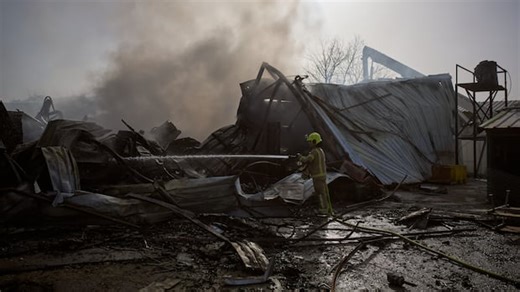 Israel accuses Iran of using cluster munitions as strikes land near Tel Aviv