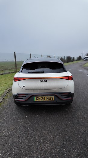 carwow on Instagram: "Our Smart #3 Brabus is a great electric car, but not everything is perfect. Here are five annoying things about it. While the interior is really spacious, the boot is quite small. We couldn’t fit a dog crate in there because of the sloping roofline. And the frunk is really small as well. You can just about cram the charging cables in there if you coil them up tight enough, but it's such a faff that you just end up chucking them under the boot floor. The reversing camera is 