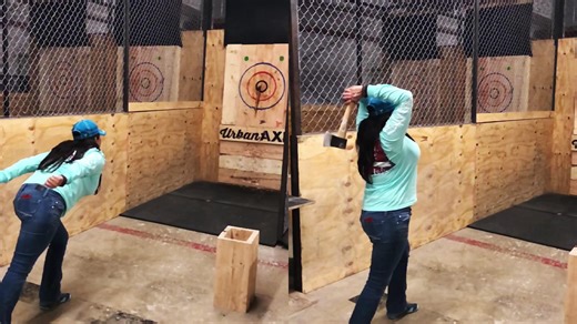 Aspiring actress shares badass slow-mo footage of her hitting a bullseye with an axe