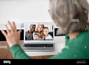 Mature grandmother using laptop for talking online with family on the distance. Senior female using computer app for video call, virtual meeting with grown children. Retirement people and technology Stock Photo - Alamy