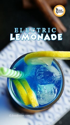 Homemade Electric Lemonade just like you get at restaurants. A long overdue promise we just fulfilled. #HappyCookingToYou #FoodFusion #DigitalAmmi #DigitalMom Ingredients: Homemade Blue Curacao Syrup: -Water 2 Cups -Sugar 1 Cup -Lemon juice ½ Cup -Namak (Salt) 1 tsp -Darchini (Cinnamon stick) 1 large -Lemon zest 1 tsp -Blue gel food color ¼ tsp or as required -Ice cubes -Lemon slices -Lemon lime (soda of your choice) -Lemon slice Directions: Homemade Blue Curacao Syrup: -In a saucepan,add water,