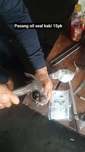 #cara pasang oil seal kaki 15pk yamaha