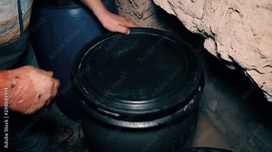 Red wine production, barrel closure with grapes for fermentation