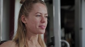 clip-1040420900-athletic-woman-beautiful-figure-trains-pectoral-muscles