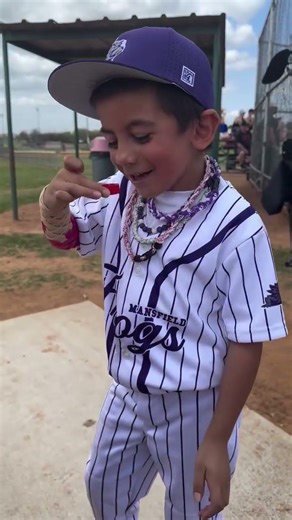 Little Leaguer Sneaking Coke During a Game