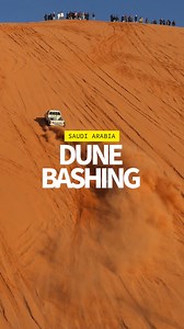 Dune bashing, or tatees in Arabic, is an adventure sport that involves driving off-road across challenging desert landscapes. The sport is a popular sport in Saudi Arabia, where a litre of petrol costs just $0.62. The cheap fuel, combined with prolonged periods of extreme heat, means cars reign supreme in the kingdom. #AFP 🎥📸Rania SANJAR Fayez NURELDINE #SaudiArabia #dunebashing | AFP News Agency