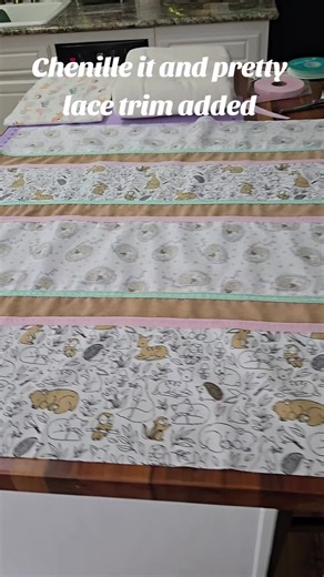 Added some pretty pale pink chenille it and green lace to the New Year's day baby quilt project. #pixiehollowcreations #sewing #sewingtiktok #learntosew #sewinggifts