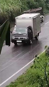 @RED AND WHITE PASS DUMP TRUCK PASSING THE EXIT ENTER MANGKLONG CENTRAL JAVA INTERIOR