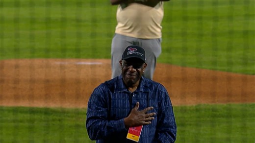 Andre Dawson catches the first pitch