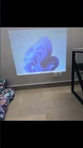 This Mini Projector Works Without a Power Outlet!