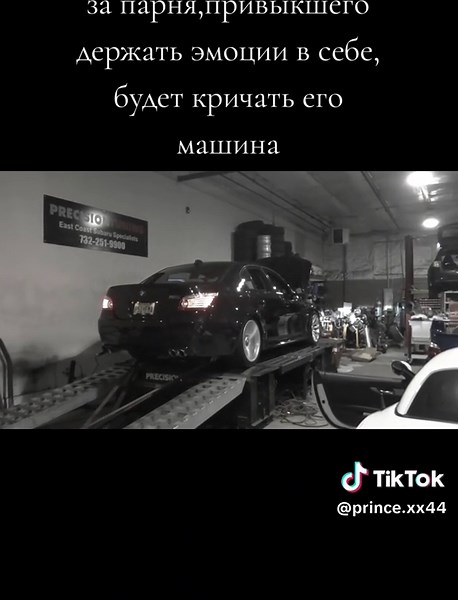 Exploring Power: Black Sports Car on Dynamometer