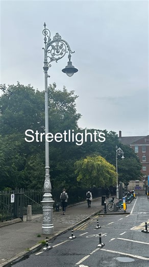 Look closely to see the pulley & wire in the old photos. We walk past remnants of our past every day without noticing. This pulley was used to drop the lantern down so it could be serviced and then hoisted back up again. These early electric lamps, up to 130 years old, held various bulb-types over the years as technology progressed. The crossbar was for balancing the serviceman’s ladder. #dublin #ireland #lighting #lightingdesign #electrification #lamppost #streetlight #streetlights #streetlamp 