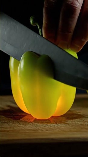 Smoothly slicing a bell pepper that glows from inside