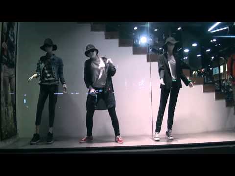 Girl posing as manikin performs insane dubstep dance