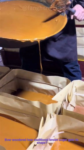 Traditional Brown Sugar Making: Pouring Molten Syrup Into Molds