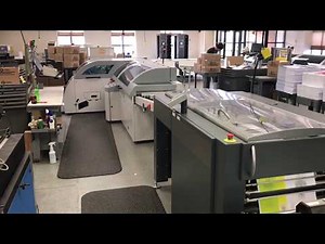Smart-binder SB-2 fed from a Tecnau/lasermax unwinder & web cutter