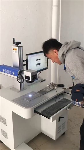 Redsail laser on Instagram: "200W high power fiber laser marking machine engraving stainless steel plate"