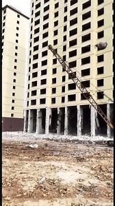 Demolition process of high-rise buildings with a large iron ball