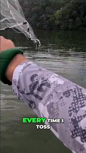 Throwing my cast net over a large school of bait!