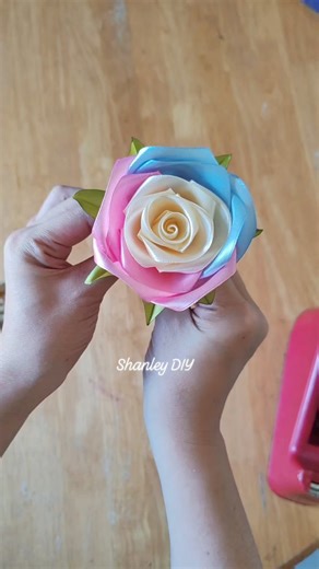 Single satin ribbon rose bouquet wrapping tutorial #satinribbon #ribbonflowers #satinribbonflower #satinbouquet #satinroses #ribbonroses #ribbonbouquet | Shanley Diy