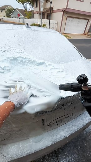 DJ Reyes | Automotive Detailing Expert on Instagram: "Foaming up your car for a pre-rinse before a contact wash helps loosen and lift dirt, grime, and contaminants from the surface, reducing the risk of scratching or swirling during the hand wash. The foam acts as a lubricant, allowing the dirt to be suspended and washed away more easily, so when you use a mitt or towel, you’re less likely to drag abrasive particles across the paint. This step improves the overall cleanliness, making the contact