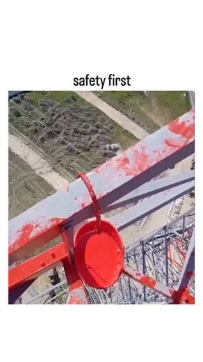 what if on Instagram: "This Reel showcases the intensely demanding job of industrial painters working on towers at extreme heights. It begins with safety preparations: painters don full-body harnesses, helmets, gloves, and secure multiple anchor points, with meticulous inspections to prevent fatal falls. On-screen text stresses "safety first." Next, surface prep involves removing rust and old paint using grinders, wire brushes, or sandblasting—crucial for adhesion, as unclean surfaces cause quic
