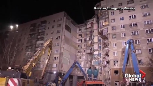 Rescue and recovery teams pour over site of building collapse in Russia
