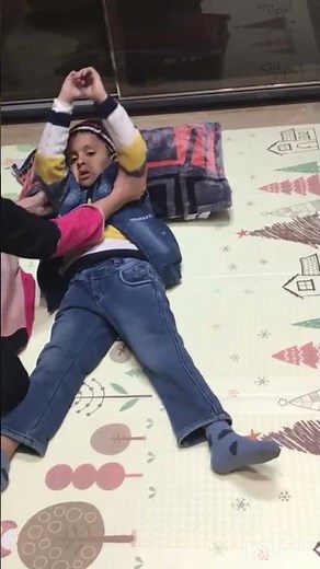 Moro Reflex integration/starfish exercise with full physical prompt