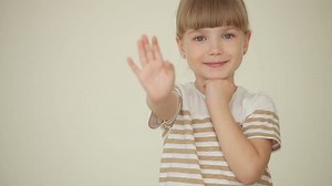 clip-3937967-girl-waves-her-hand-laughing