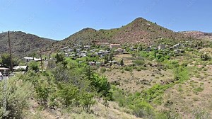 Historic town of Jerome, Arizona. Houses in green hills.