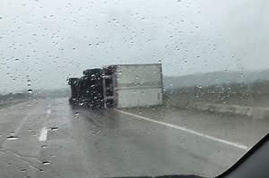 Winds topple semi-trucks during dangerous storm