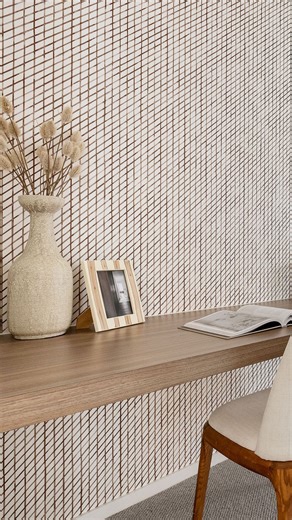 Carlisle Homes on Instagram: "This is what modern first-home style looks like heading into 2026 ✨ Inside the Ashbourne Grand Pantry 23 at Ridgelea, a Relaxed Traditional interior blends Danish Walnut Laminex cabinetry with Beaumont’s kit-kat tiled splashbacks for a look that feels fresh yet timeless. Designed within the EasyLiving series, it proves first homes can feel elevated, warm and effortlessly liveable. Visit the display to see it in person. #FirstHomeBuyer #InteriorTrends #DisplayHome"