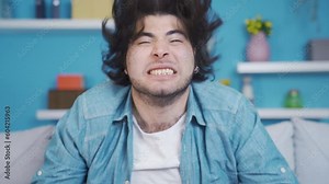 Young man who is a heavy metal fan.