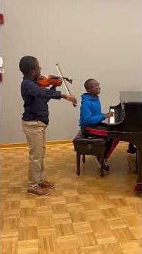 Brothers arguing over viola tuning