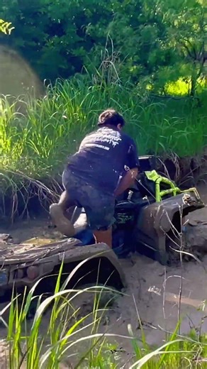 Can am outlander in rock tires going through the mud