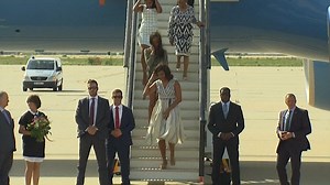 Michelle Obama and daughters land in Spain on a windy day