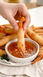 Easy firecracker shrimp recipe you'll love! Ingredients15–20 large raw shrimp/prawn (peeled, deveined, tails on)15–20 spring roll wrappers ( cut into triangles)½ tsp garlic powder1 tsp salt1 tsp sesame oilPinch of black or white pepper1 tbsp plain flour 2 tbsp water (for sealing)Oil for deep frying | Khin's Kitchen