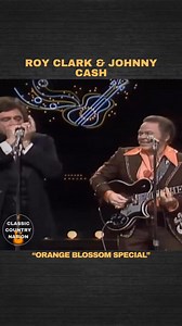 When Johnny Cash and Roy Clark take on “Orange Blossom Special,” you’re not just hearing a song, you’re boarding a runaway train.It’s harmonica fire meets lightning-fast strings, and the ride never slows down.Hold on tight, because this track doesn’t stop for breath. | Classic Country Nation