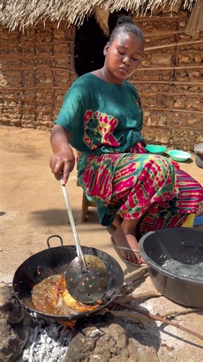 African village mum deep frying fish to crispy perfection #shorts #cooking #africa #villagevlog #fyp