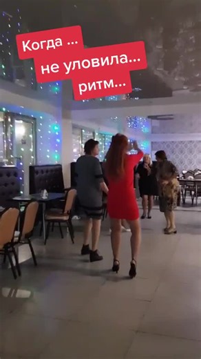 Celebratory Dance Party in a Vibrant Restaurant Setting