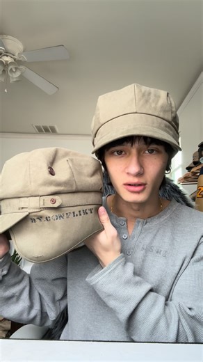 CNFLKT.co on Instagram: "The final piece of the collection is in!! Introducing our 2LT cap. A fun, utilitarian spin on the cadet hat, 2LT being 2nd lieutenant, one rank above cadet. These hats feature a 8 pleat crown, a band with 2 size adjusting straps, a short brim, and the signature extended ear flaps, lined with waffle cotton and adorned with DTG graphics on either side. #fyp #viral #fashion #vintage #military"