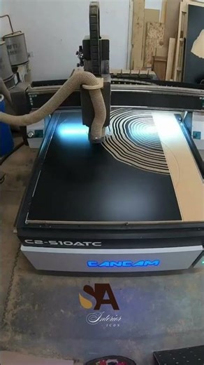 Organic design etched into a sheet of material by a CanCam C2-510ATC industrial router