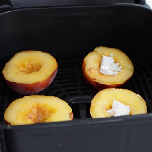 Learn how to make an amazing air fryer peach. It takes just a few minutes of prep and about 10 minutes of cooking. It is so good and one of my favorite ways to eat a peach. | In The Kitchen With Matt