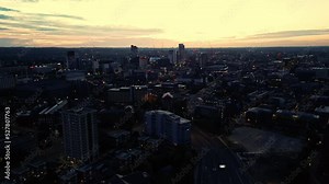 Leeds skyline during a summer sunrise showing Altus House and surrounding buildings and cranes