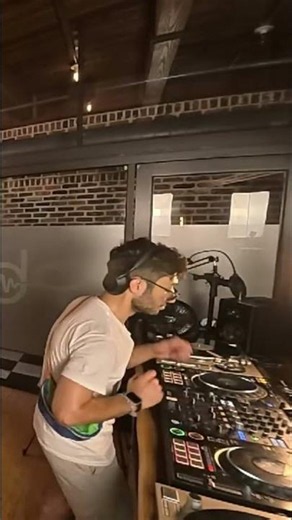 DJ Skillfully Mixes Music at Lively Party #shorts