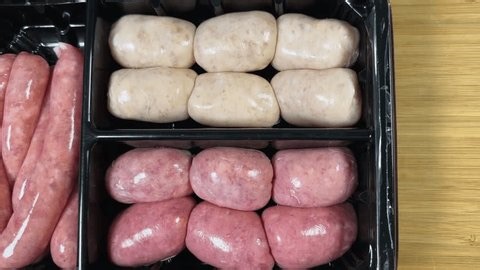 clip-3999056149-set-raw-thick-short-chicken-veal-sausages